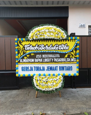 Papan Bunga Duka di Maidi